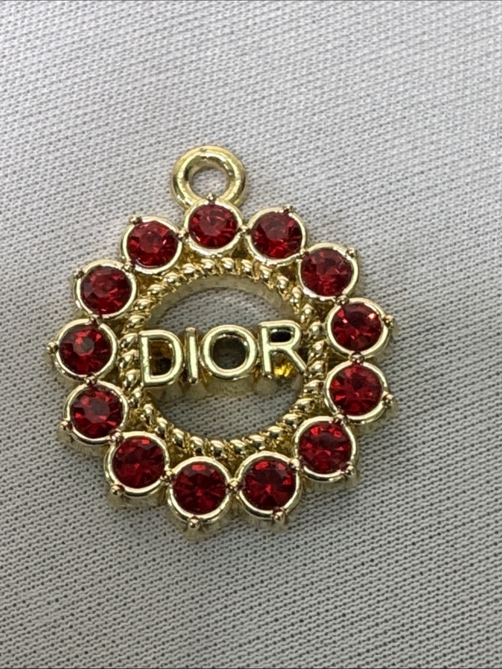 Gold-Tone Pendant with Red Crystal Halo